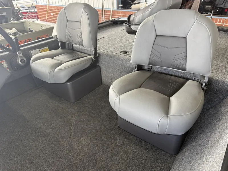 Slide: The Image of 2025 Tracker Bass Tracker Classic XL boat interior with two gray seats. - 6
