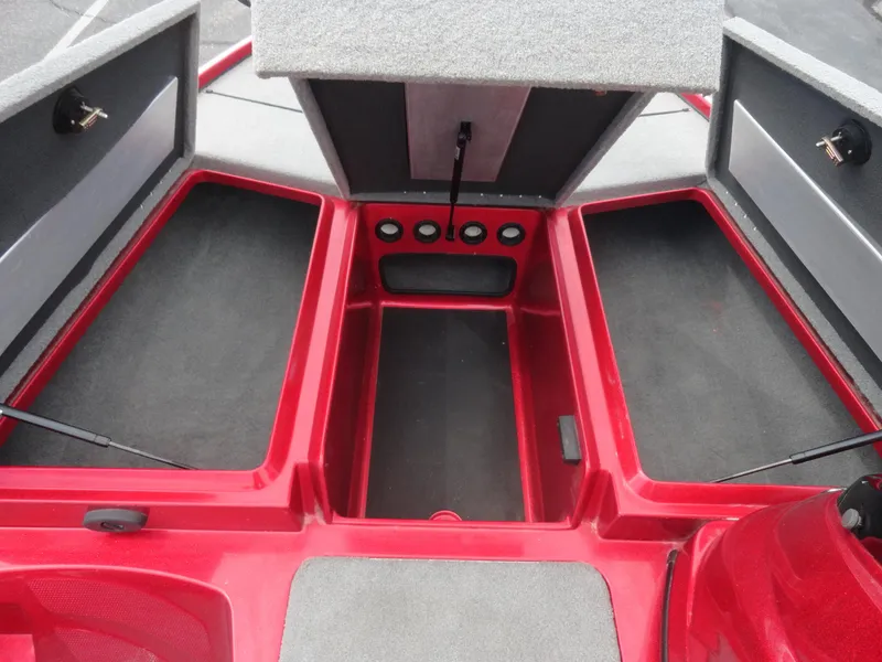 Slide: The Image of 2018 Nitro Z17 boat storage compartments with open lids, showcasing spacious interior. - 16