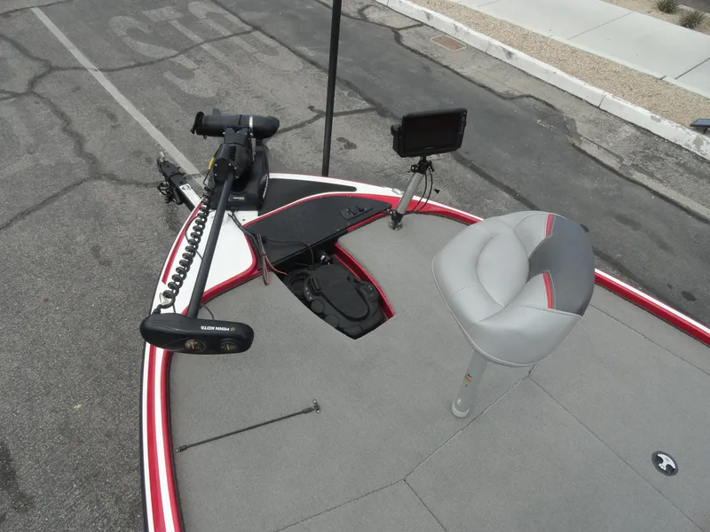 Slide: The Image of 2018 Nitro Z17 boat deck with seat, trolling motor, and fish finder. - 17