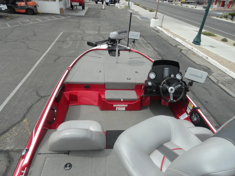 Slide: The Image of 2018 Nitro Z17 boat interior with steering wheel and Garmin navigation system. - 7