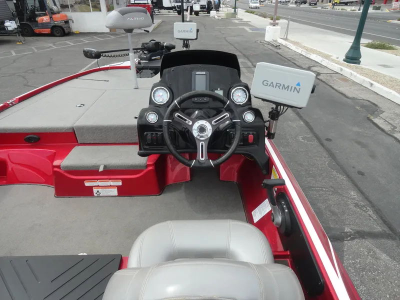 Slide: The Image of 2018 Nitro Z17 boat interior with Garmin navigation system and steering wheel. - 9