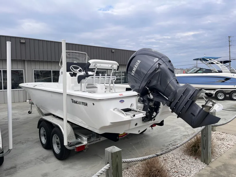Slide: The Image of 2025 Tidewater 2110 Bay Max boat on trailer with Yamaha outboard motor. - 3