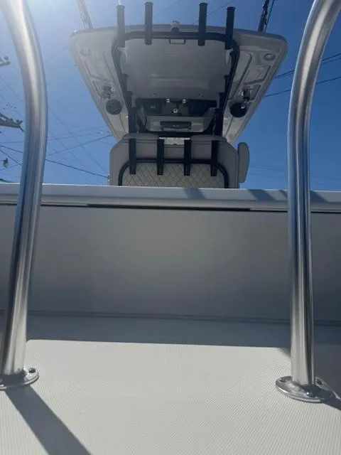 Slide: The Image of 2023 World Cat 260 CC-X boat, view of helm and stainless steel railings. - 11