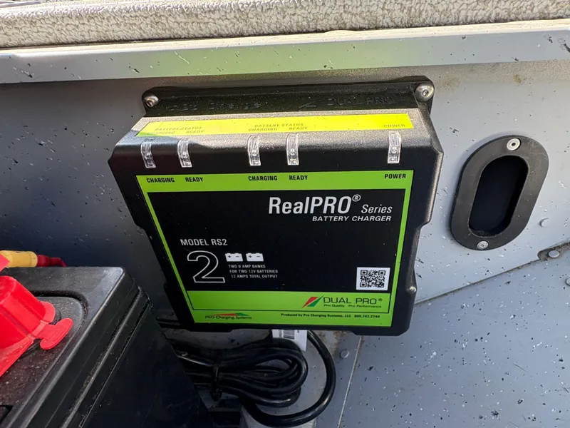 Slide: The Image of RealPRO Series battery charger in 2021 Lund 1600 Fury Tiller boat. - 13
