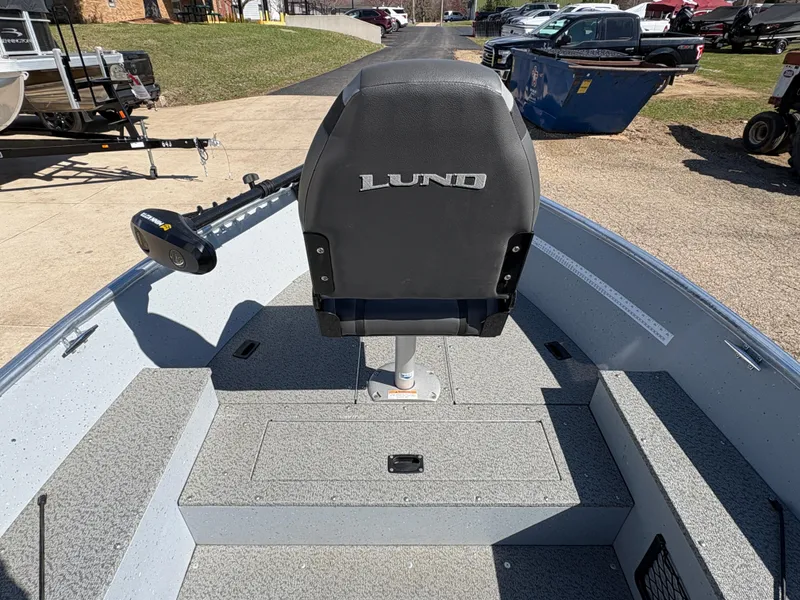 Slide: The Image of 2021 Lund 1600 Fury Tiller boat interior with seat and storage compartments. - 9