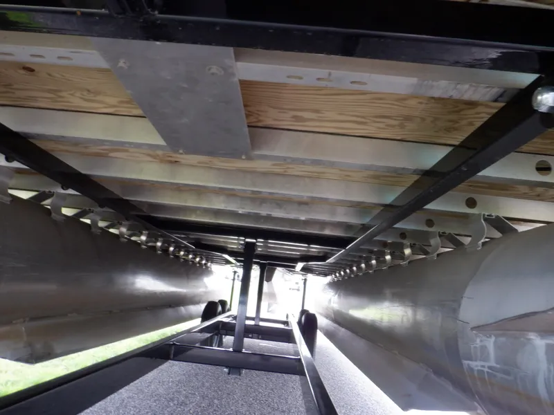Slide: The Image of Underneath view of a 2013 Harris FloteBote Cruiser 240 pontoon boat. - 11