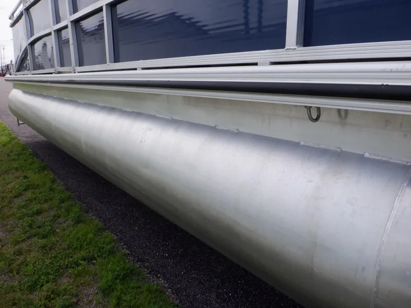 Slide: The Image of 2013 Harris FloteBote Cruiser 240 pontoon side view, showcasing aluminum structure. - 16