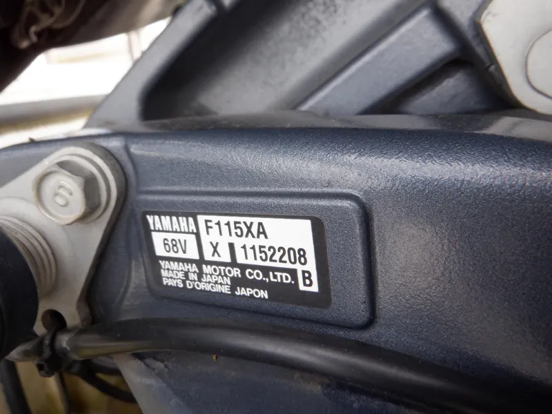 Slide: The Image of Yamaha F115XA engine label on 2013 Harris FloteBote Cruiser 240. - 24