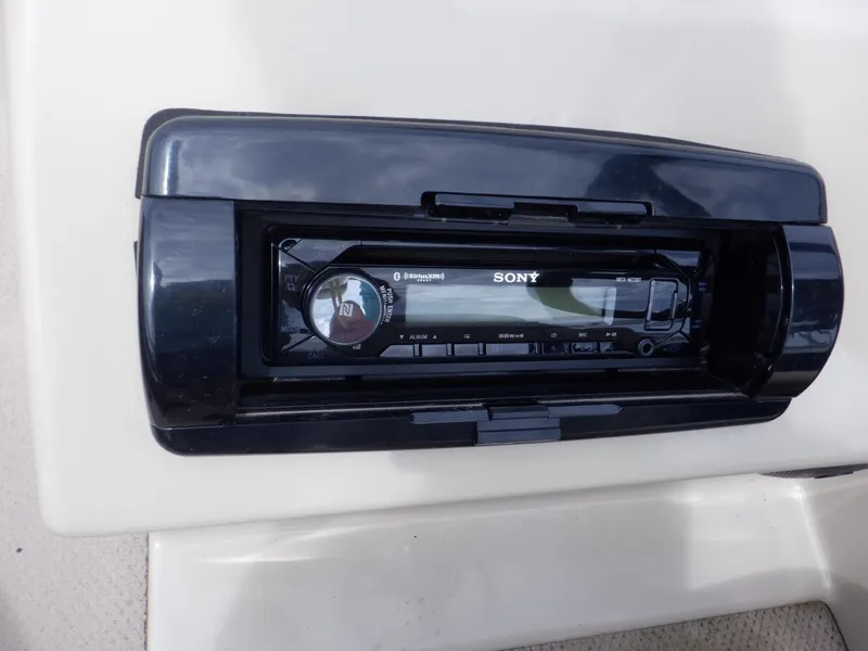 Slide: The Image of Sony stereo system on 2013 Harris FloteBote Cruiser 240 boat dashboard. - 33