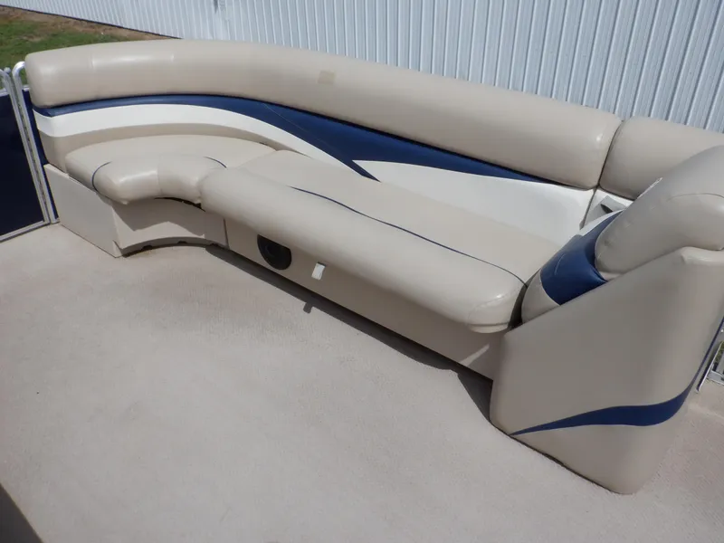 Slide: The Image of 2013 Harris FloteBote Cruiser 240 pontoon boat seating, beige and blue upholstery. - 38