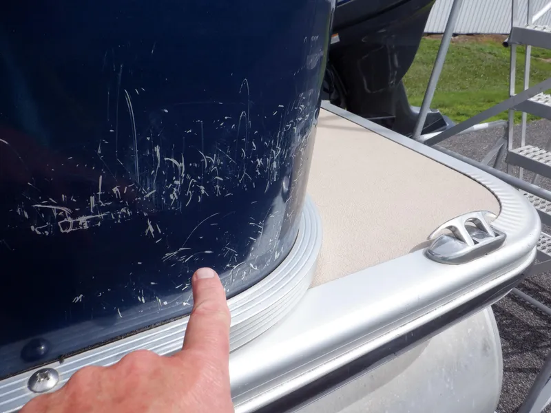 Slide: The Image of Close-up of scratches on a 2013 Harris FloteBote Cruiser 240 pontoon boat. - 7