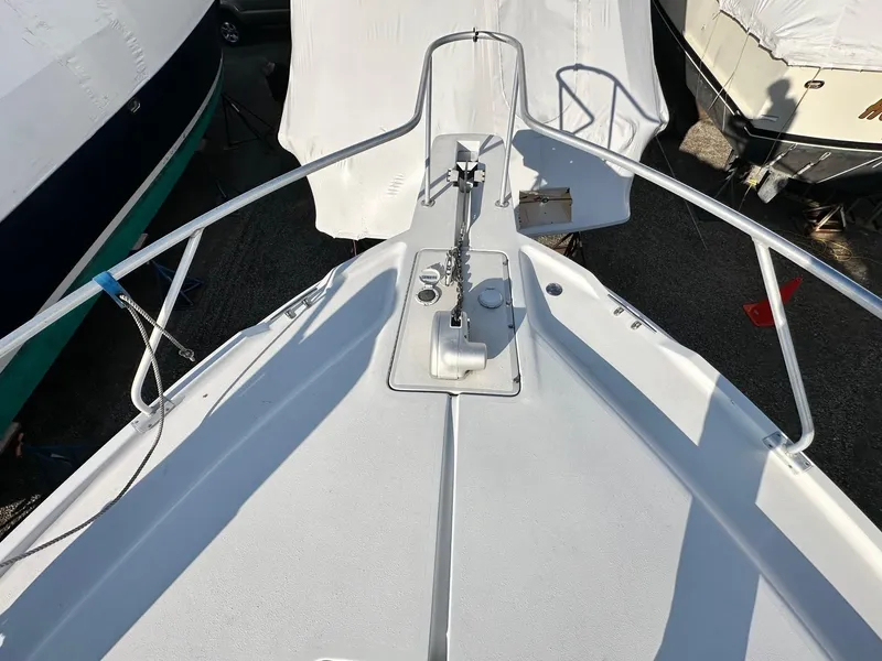 Slide: The Image of Bow view of 1996 Mainship 40 Sedan Bridge yacht in storage. - 23