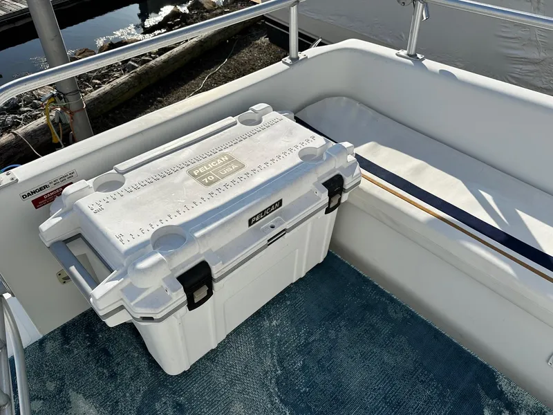 Slide: The Image of Pelican cooler on 1996 Mainship 40 Sedan Bridge boat deck. - 8