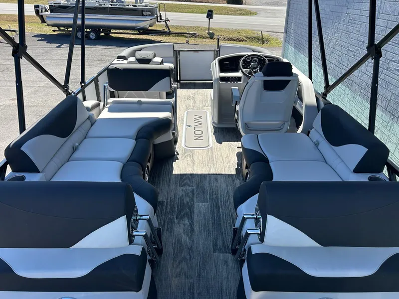 Slide: The Image of 2025 Avalon LSZ 2185 Quad Lounger Shift pontoon boat interior with luxurious seating. - 7