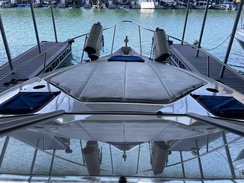 Slide: The Image of 2005 Regal 2860 Express Cruiser docked at marina, viewed from bow. - 10