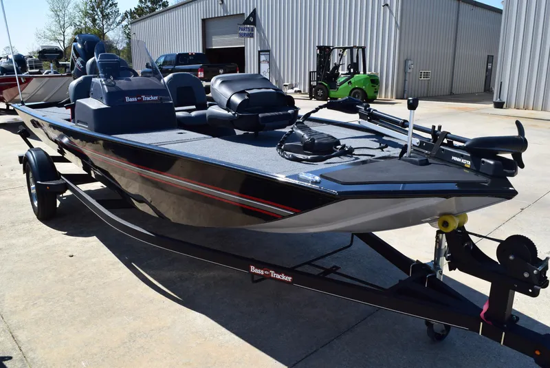 Slide: The Image of 2022 Tracker Bass Tracker Classic XL boat on trailer, parked outdoors. - 3