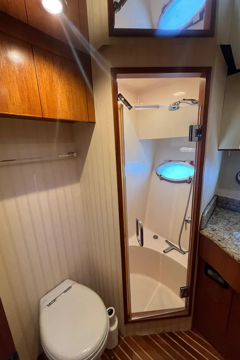 Slide: The Image of Bathroom interior of 2005 Ocean Alexander 52 Sedan yacht with shower and toilet. - 19