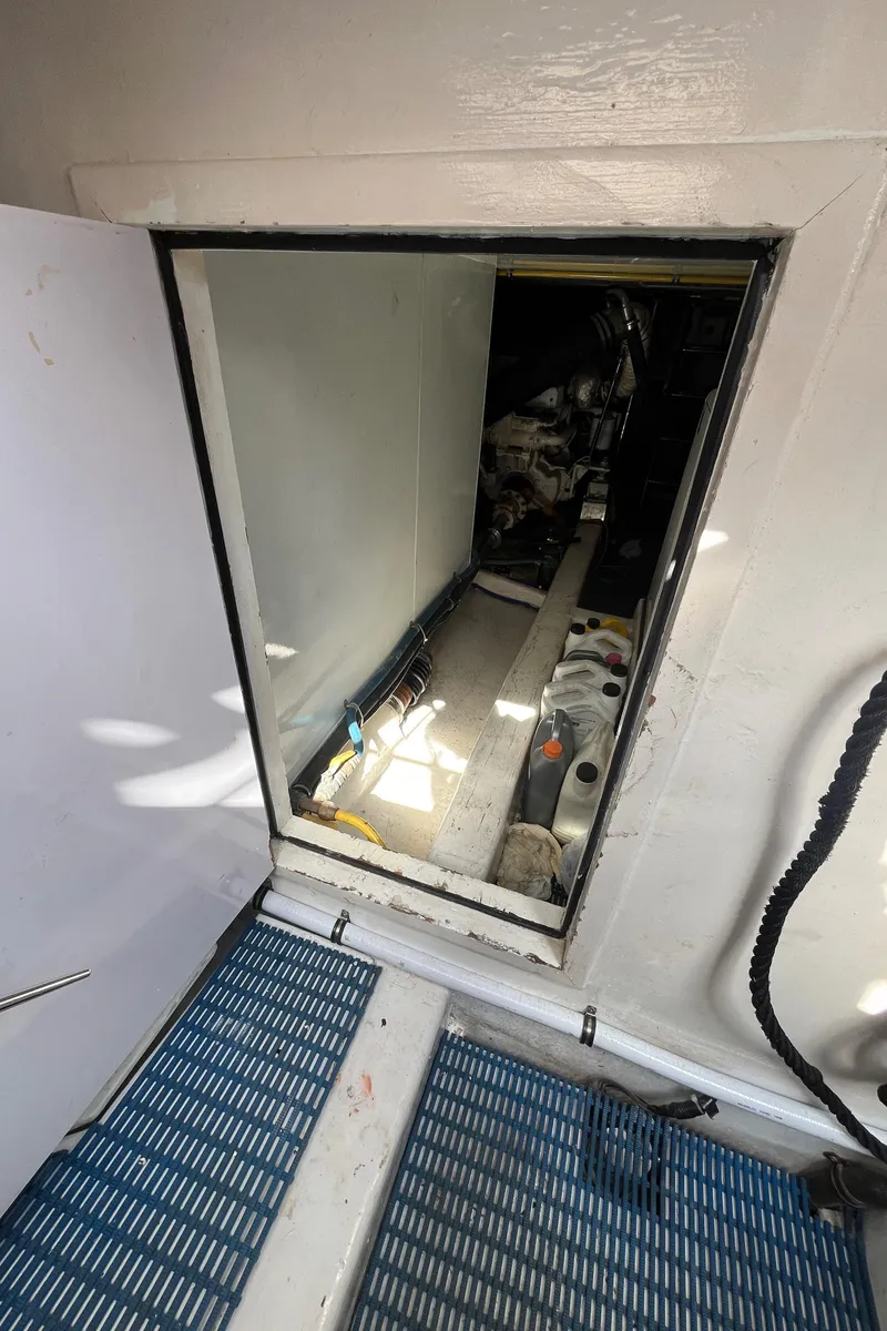 Slide: The Image of Engine room access on 2005 Ocean Alexander 52 Sedan yacht. - 22