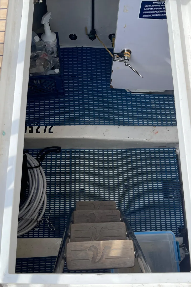Slide: The Image of Engine room access of 2005 Ocean Alexander 52 Sedan yacht. - 23