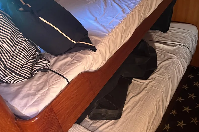 Slide: The Image of Bunk beds with striped pillows in 2005 Ocean Alexander 52 Sedan yacht interior. - 32