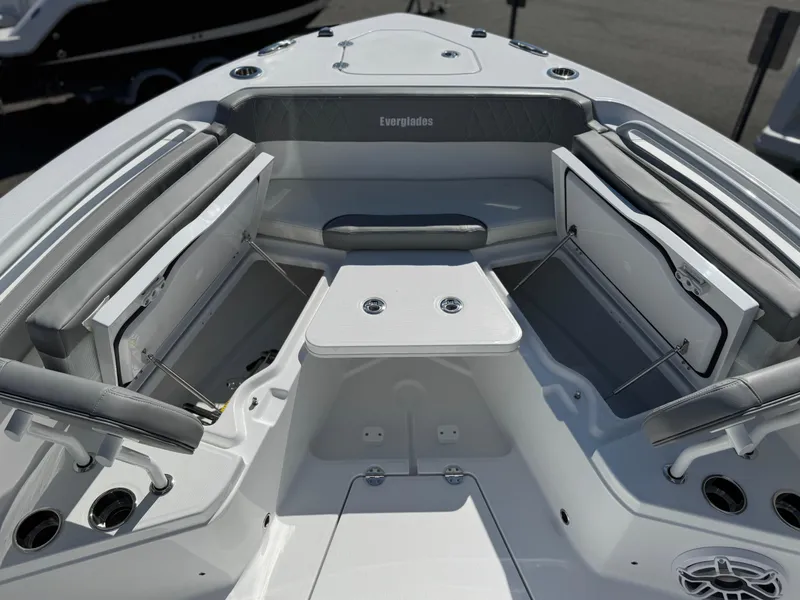 Slide: The Image of 2025 Everglades 285 Center Console boat interior with seating and storage compartments. - 10