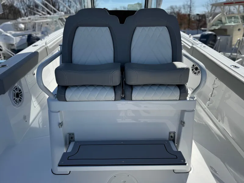 Slide: The Image of 2025 Everglades 285 Center Console boat seats, featuring modern design and comfortable cushioning. - 19