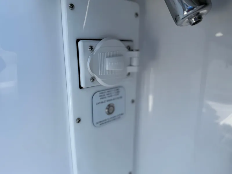 Slide: The Image of 2025 Everglades 285 Center Console boat electrical outlet detail. - 30
