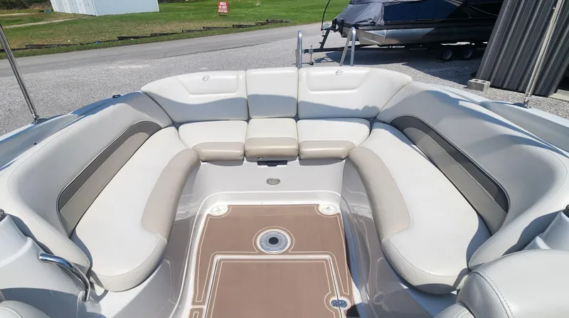 Slide: The Image of 2008 Crownline 240LS boat interior with spacious seating and elegant design. - 7
