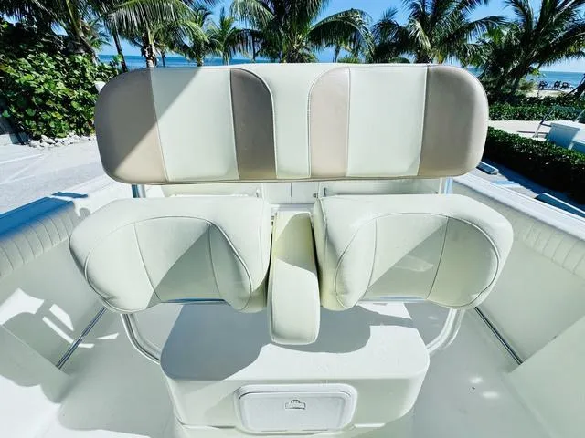 Slide: The Image of 2011 Hydra-Sports 2300CC boat seating with palm trees in the background. - 11