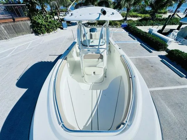 Slide: The Image of 2011 Hydra-Sports 2300CC boat in a parking lot, surrounded by greenery. - 19