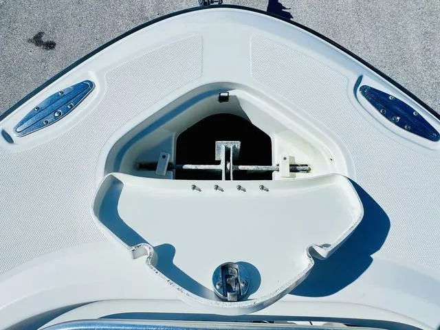 Slide: The Image of 2011 Hydra-Sports 2300CC boat anchor compartment, featuring a clean, white design. - 20
