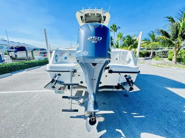 Slide: The Image of 2011 Hydra-Sports 2300CC boat with Yamaha 250 V6 engine, parked outdoors. - 4