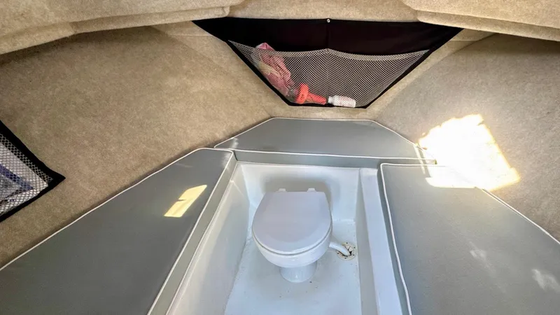 Slide: The Image of 2016 Parker 2820 XLD Sport Cabin interior with toilet and storage compartments. - 23