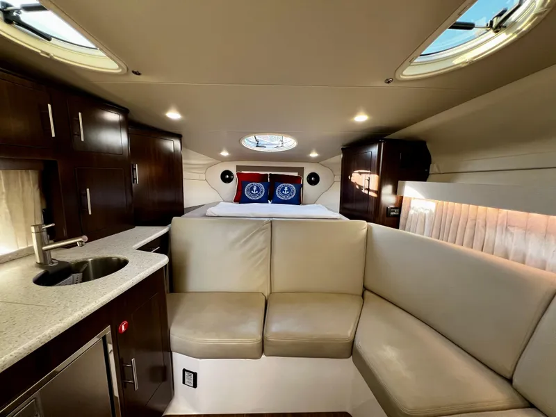 Slide: The Image of Engine compartment of a 2018 Regal 33 Express boat, showcasing detailed mechanical components. - 14