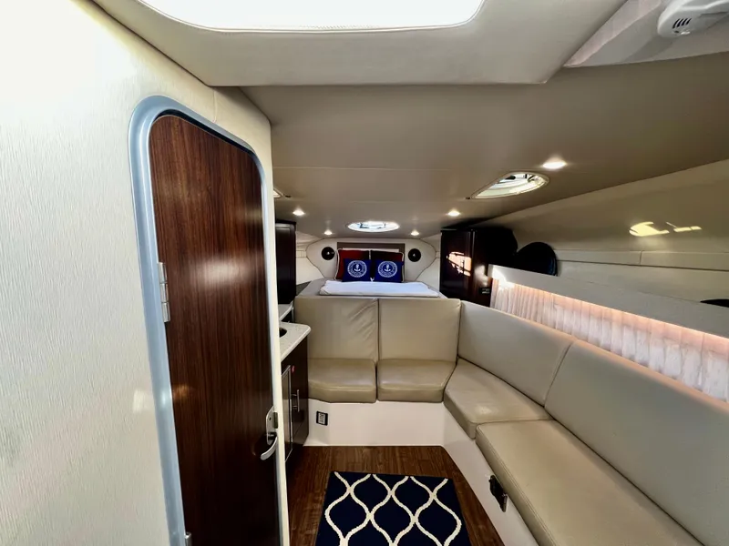 Slide: The Image of Luxurious interior of 2018 Regal 33 Express yacht with modern seating and elegant decor. - 31