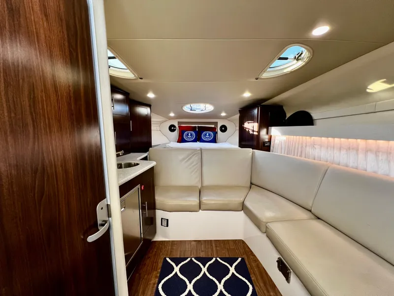 Slide: The Image of Luxurious interior of 2018 Regal 33 Express yacht with plush seating and modern amenities. - 32