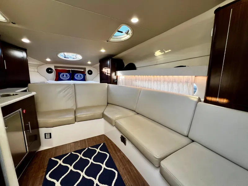 Slide: The Image of Luxurious interior of 2018 Regal 33 Express yacht with plush seating and modern design. - 33