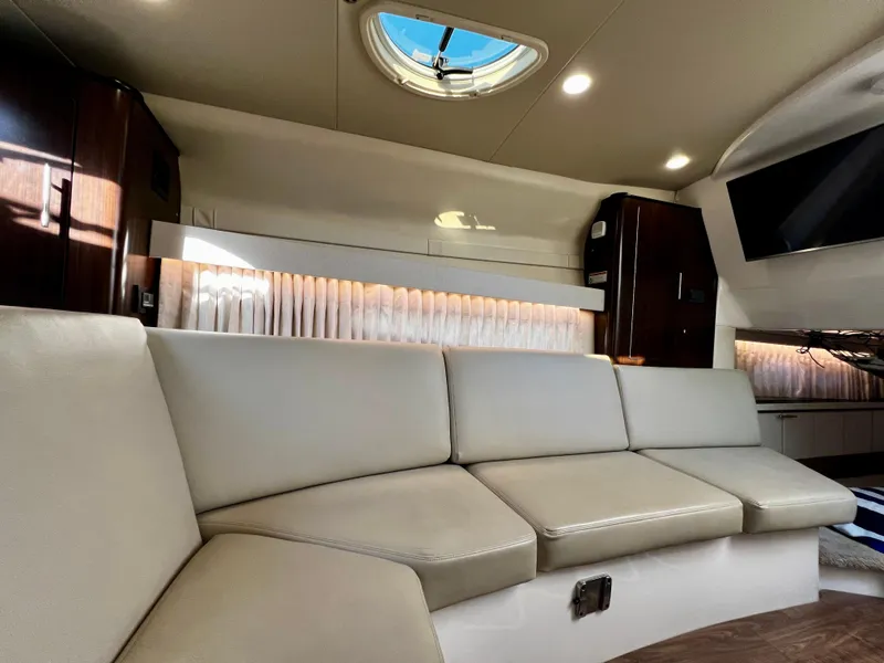 Slide: The Image of Interior of 2018 Regal 33 Express yacht with beige seating and modern design. - 39