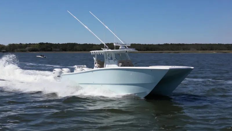 Slide: The Image of 2024 Freeman 37 VH boat cruising on open water, showcasing sleek design and powerful performance. - 0