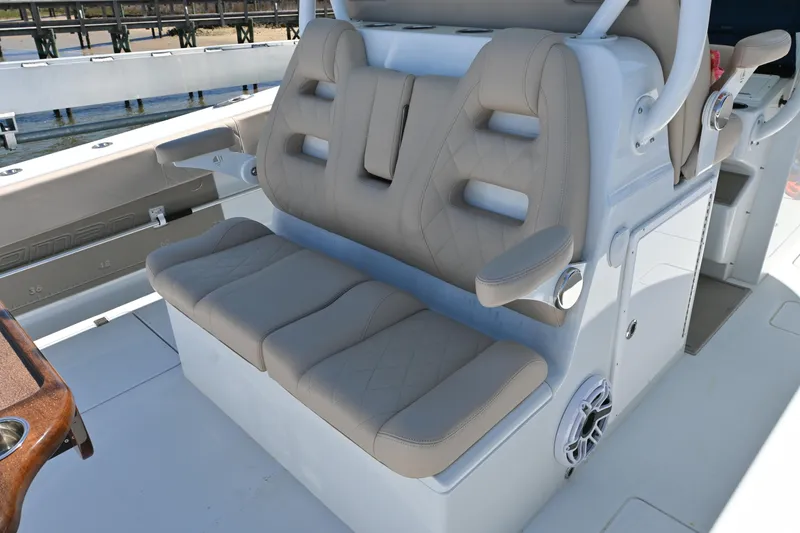 Slide: The Image of 2024 Freeman 37 VH boat seating with beige cushions and armrests. - 16