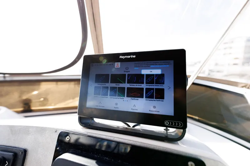 Slide: The Image of Raymarine navigation display on 2003 Regal Commodore 3880 yacht dashboard. - 17