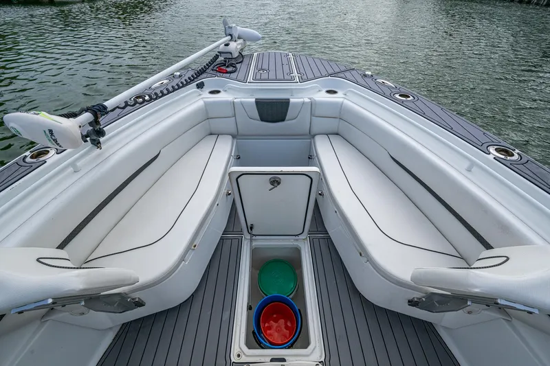 Slide: The Image of 2020 Wellcraft 302 Fisherman boat interior with seating and storage compartments. - 39