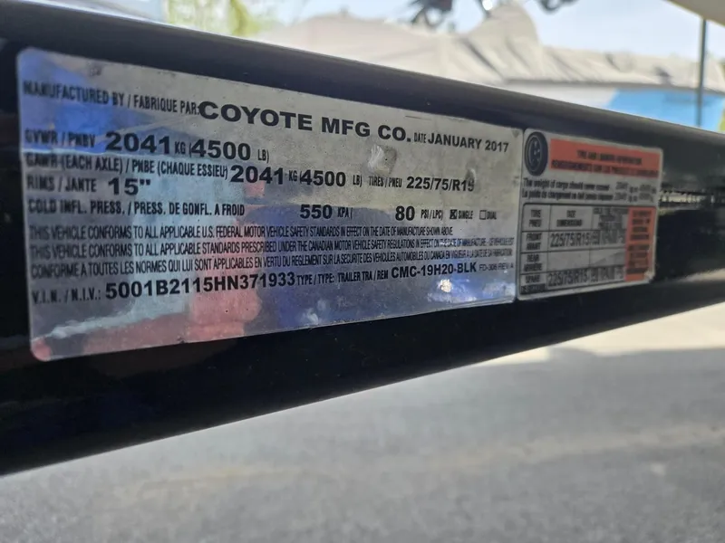 Slide: The Image of 2017 Chaparral 19H20 trailer label by Coyote MFG Co., showing specifications and compliance details. - 24