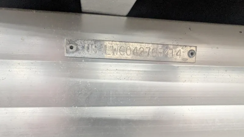 Slide: The Image of Metal identification plate on Lowe 2183, 2014 model, with serial number. - 8