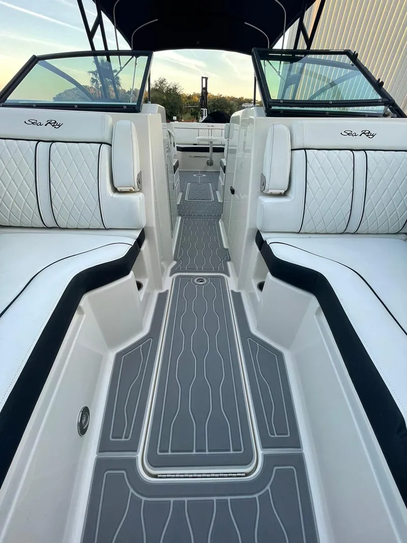 Slide: The Image of 2015 Sea Ray 290 Sundeck interior with sleek seating and modern design. - 13