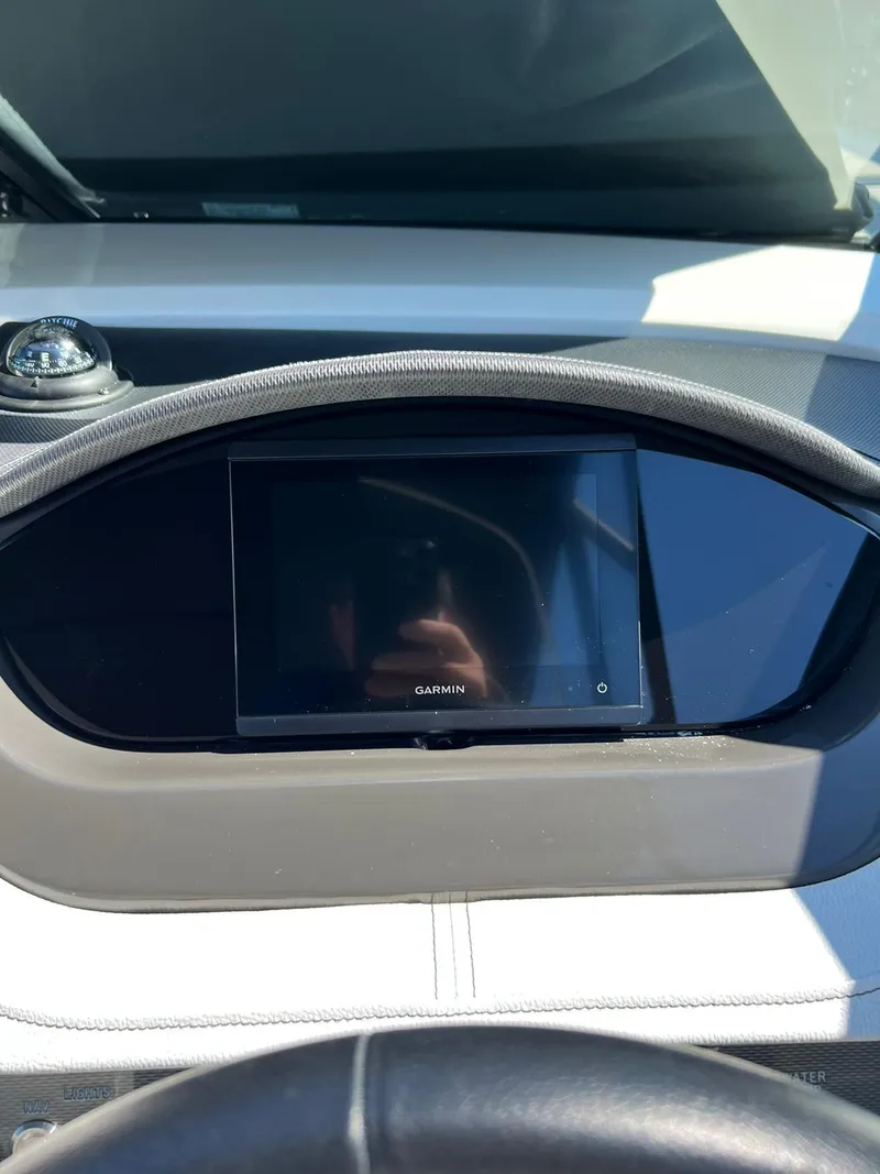 Slide: The Image of Dashboard of 2015 Sea Ray 290 Sundeck with Garmin display. - 7