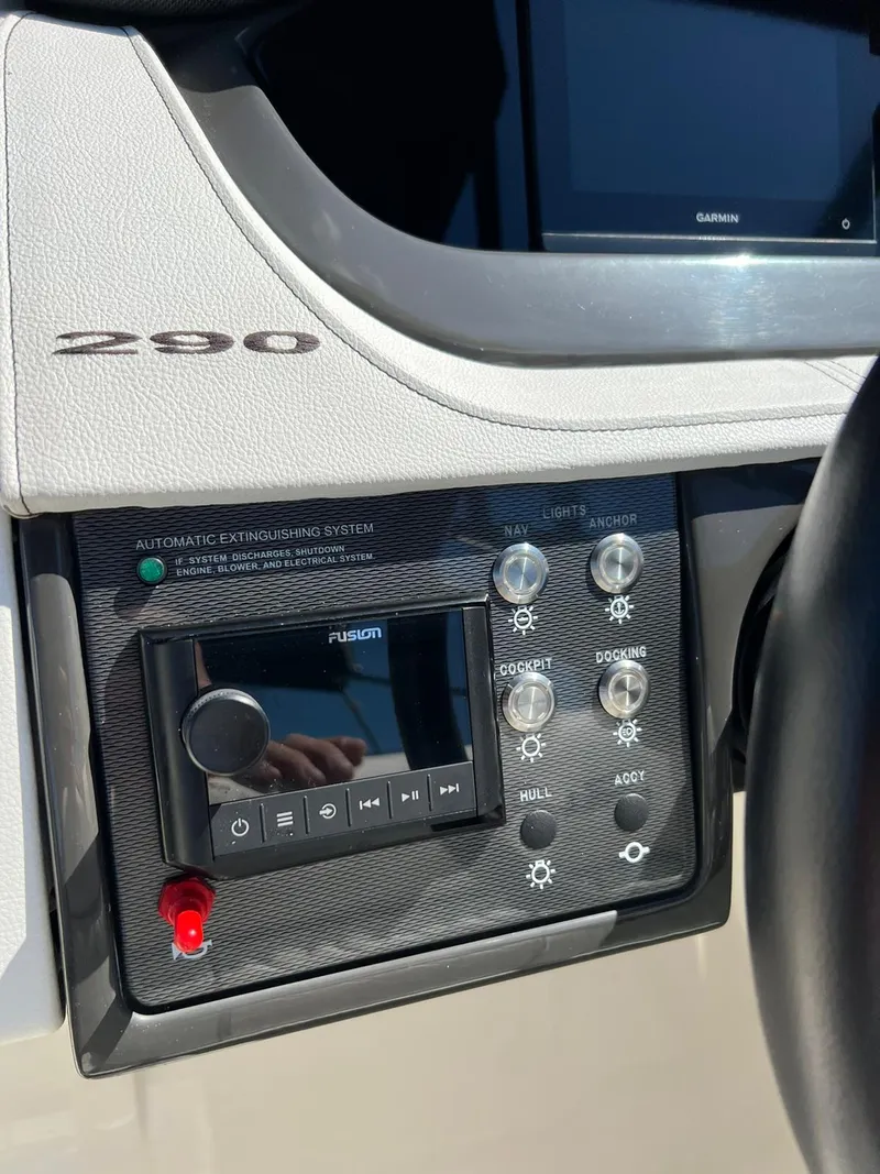 Slide: The Image of Control panel of a 2015 Sea Ray 290 Sundeck boat with Fusion audio system. - 8