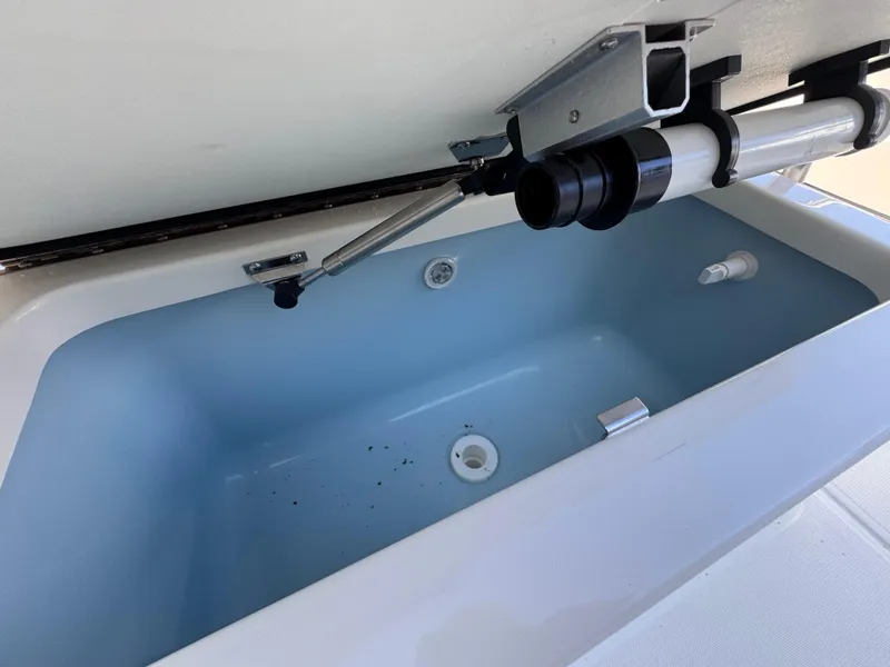 Slide: The Image of Livewell compartment in a 2025 Boston Whaler 170 Montauk boat. - 4