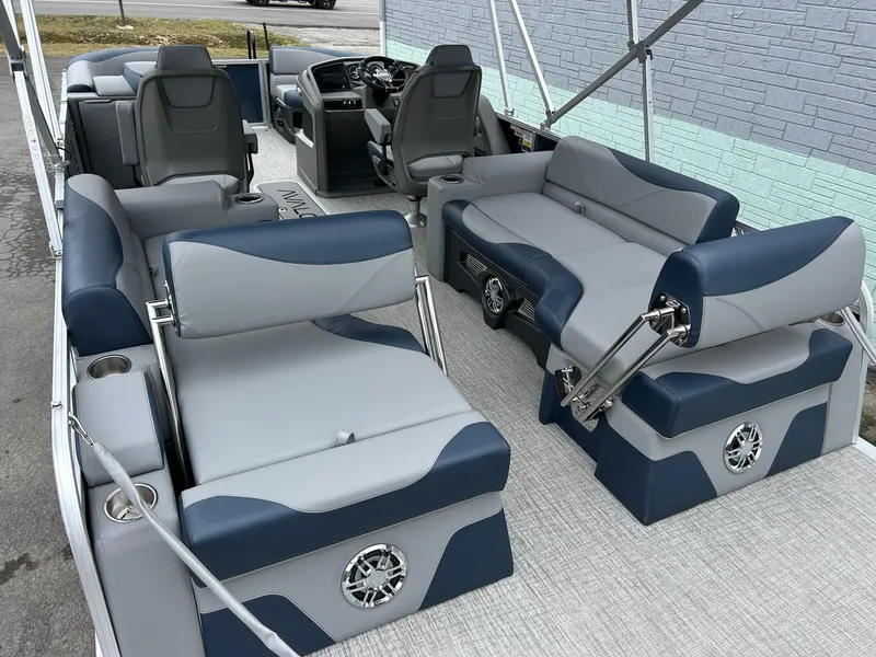 Slide: The Image of 2025 Avalon LSZ 2585 Quad Lounger Shift pontoon boat with luxurious seating and modern design. - 12