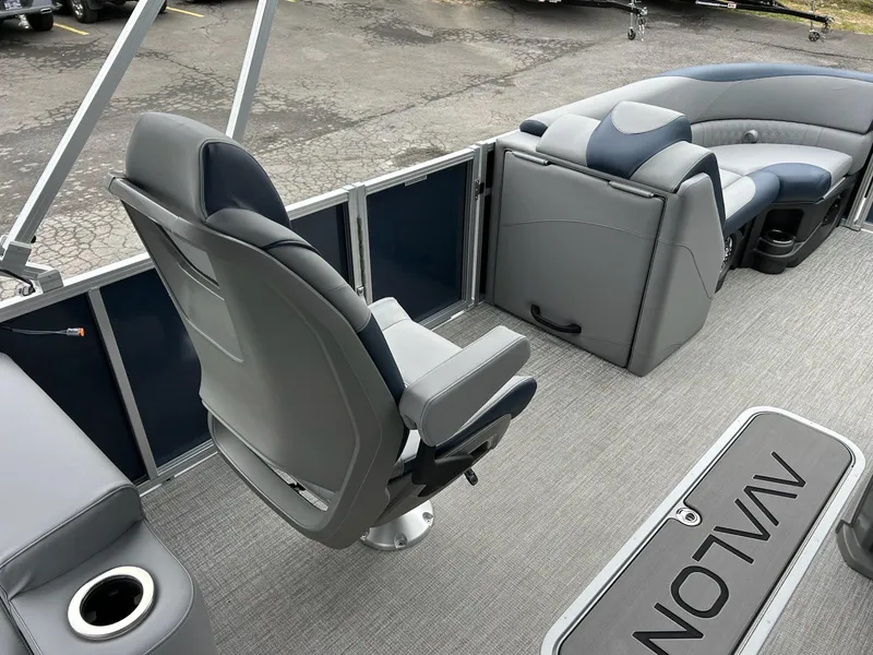 Slide: The Image of 2025 Avalon LSZ 2585 Quad Lounger Shift interior with gray seating and flooring. - 9